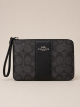 MUÑEQUERA COACH MONOGRAMA NEGRA