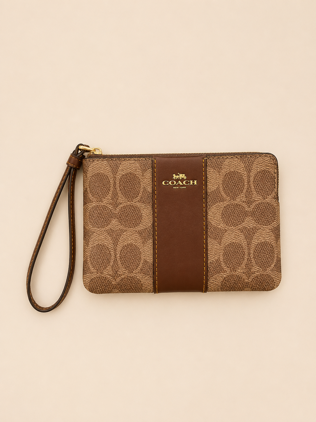 MUÑEQUERA COACH SIGNATURE CAFÉ CON CORREA