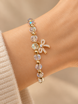 PULSERA CRISTALES MOÑO PLATEADO
