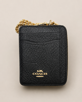 CARTERA COACH NEGRA CON CADENA